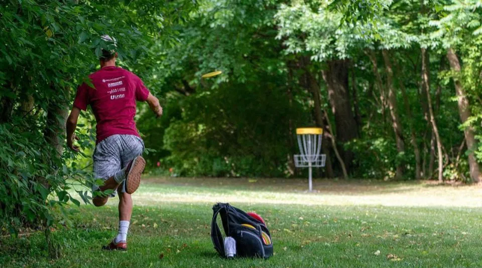 Disc Golfer approaching the Green